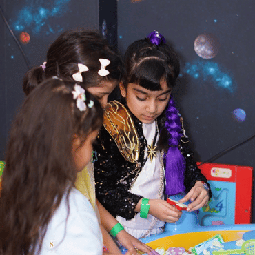 Children enjoying a hospital-themed pretend play activity at Mio Wooray.