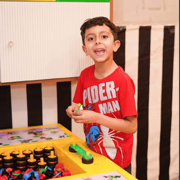 Children enjoying a hands-on creative building activity at Mio Wooray.